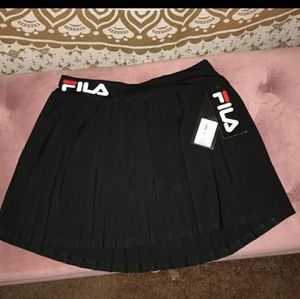 appr 14-15 in long pleated tennis skirt